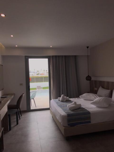 Sunshine Hotel Tigaki ภายนอก รูปภาพ